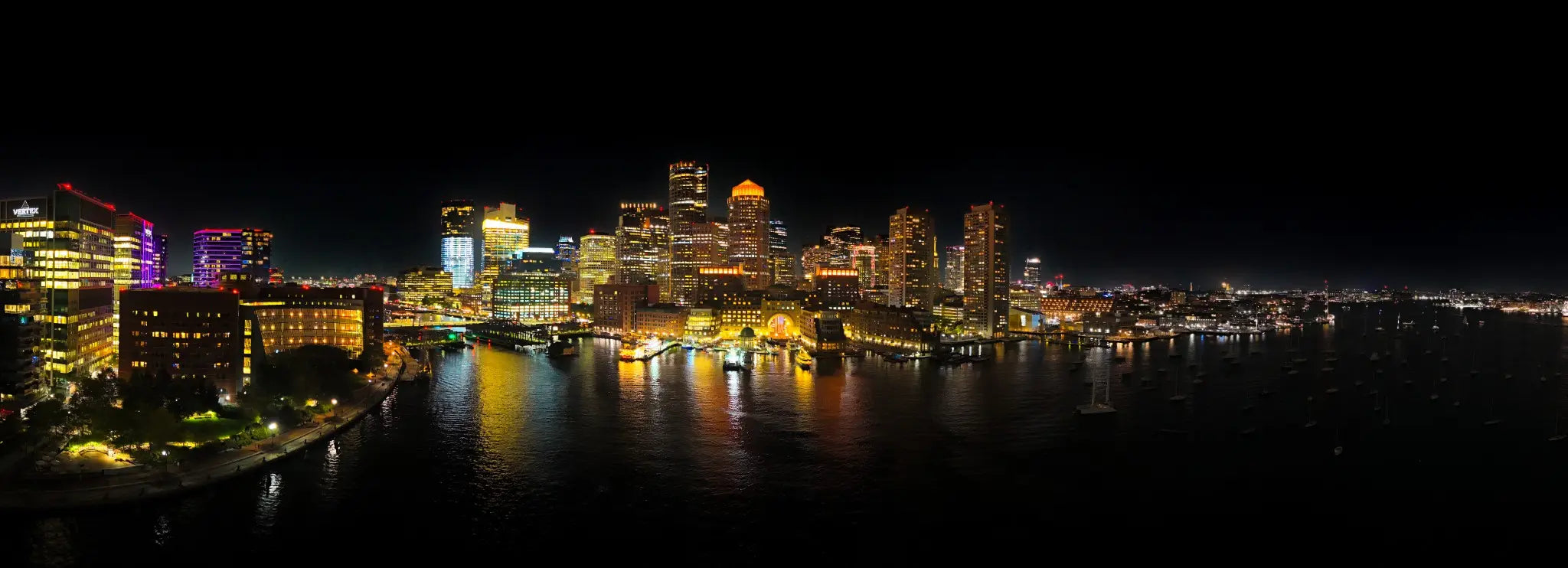 The harbor illuminated — aerial photograph by Aldo Cinematic